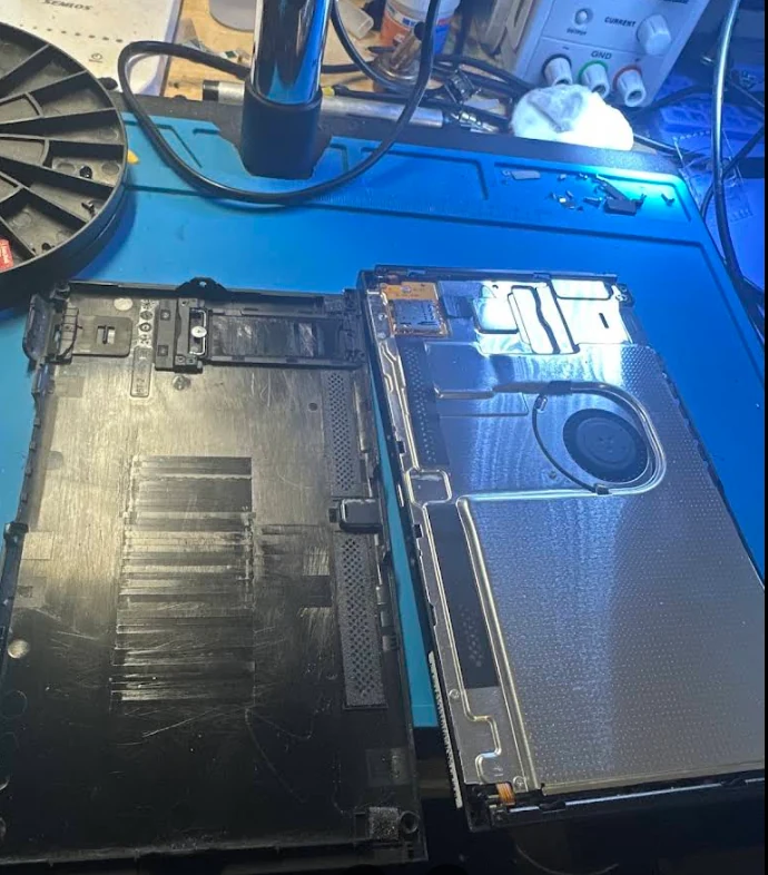 Nintendo Switch OLED opened for internal repair